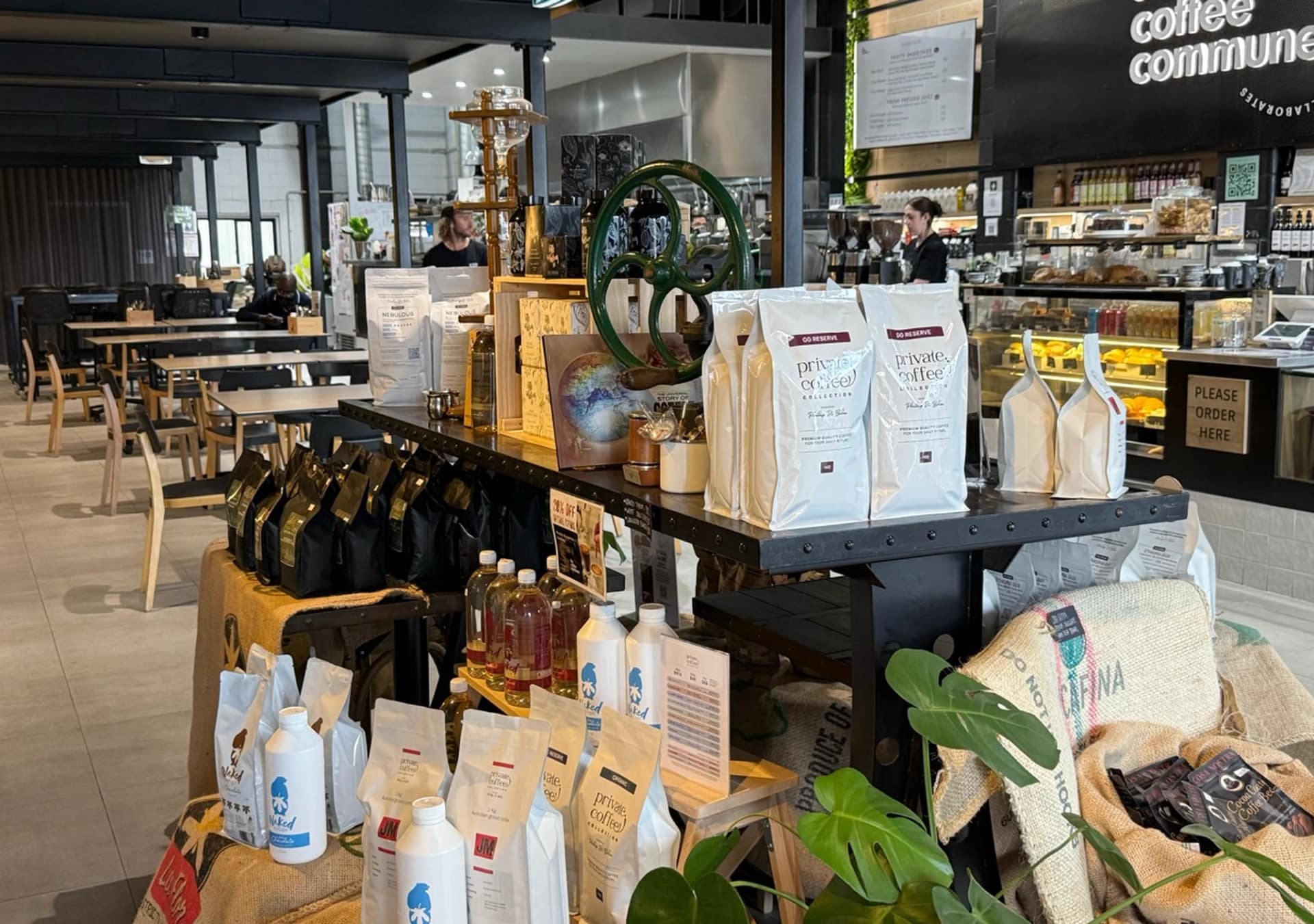 Coffee displays and seating inside The Coffee Commune