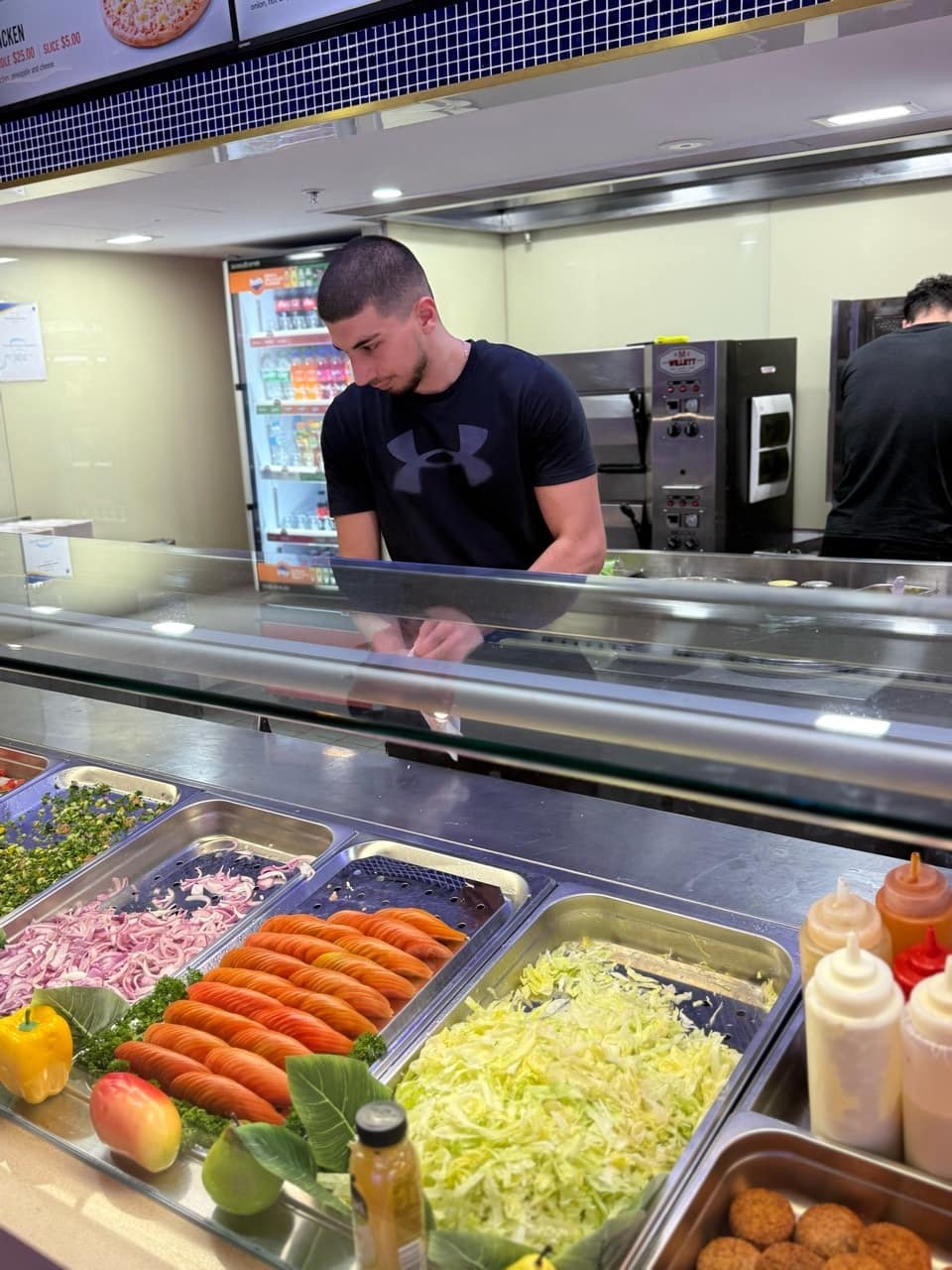 Muhammad Ali during service at Ozi Yiros.