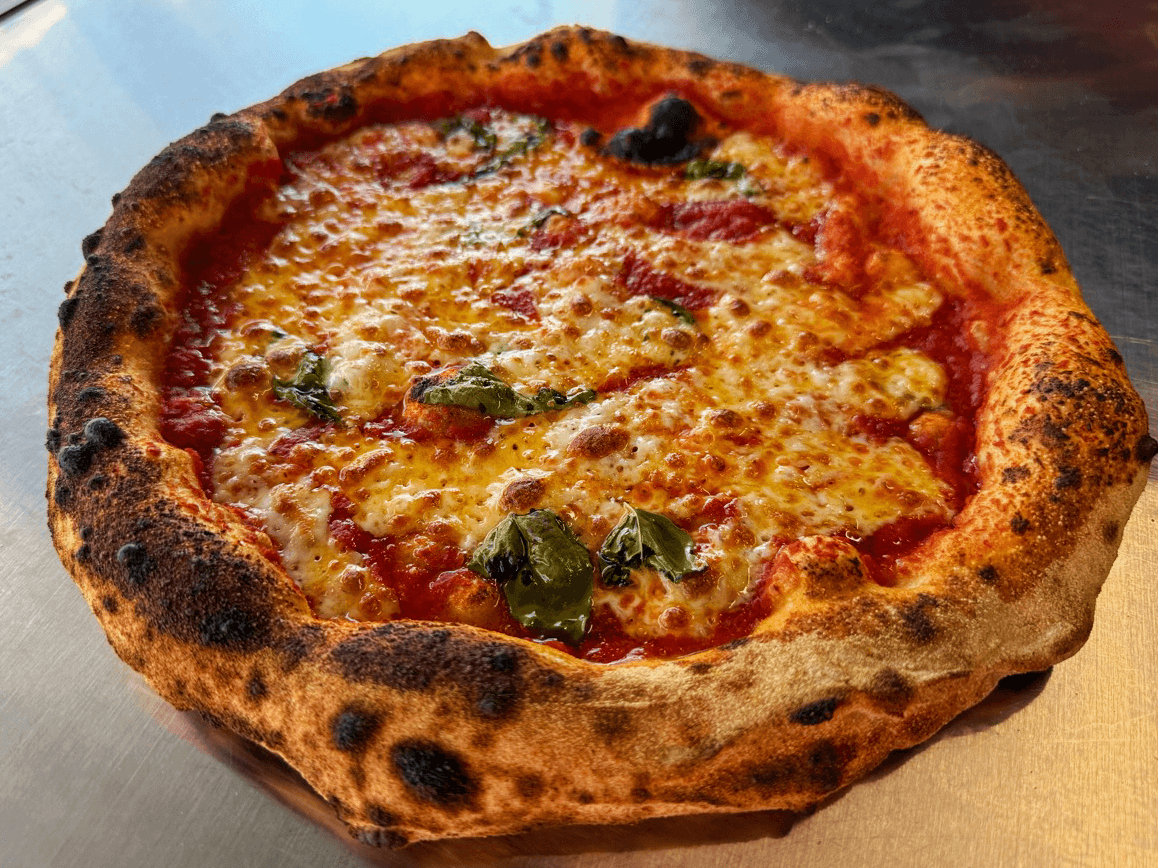A finished pizza on the counter at Solo Italiano.