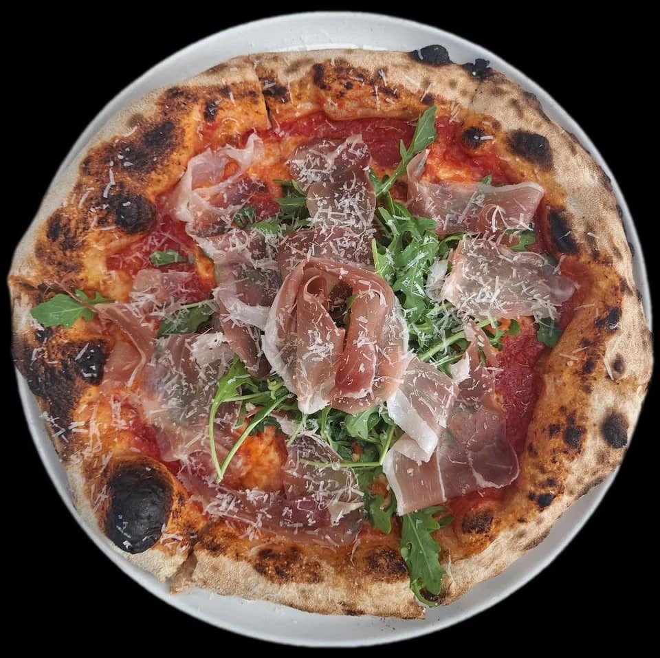 Solo Italiano pizza topped with prosciutto and rocket