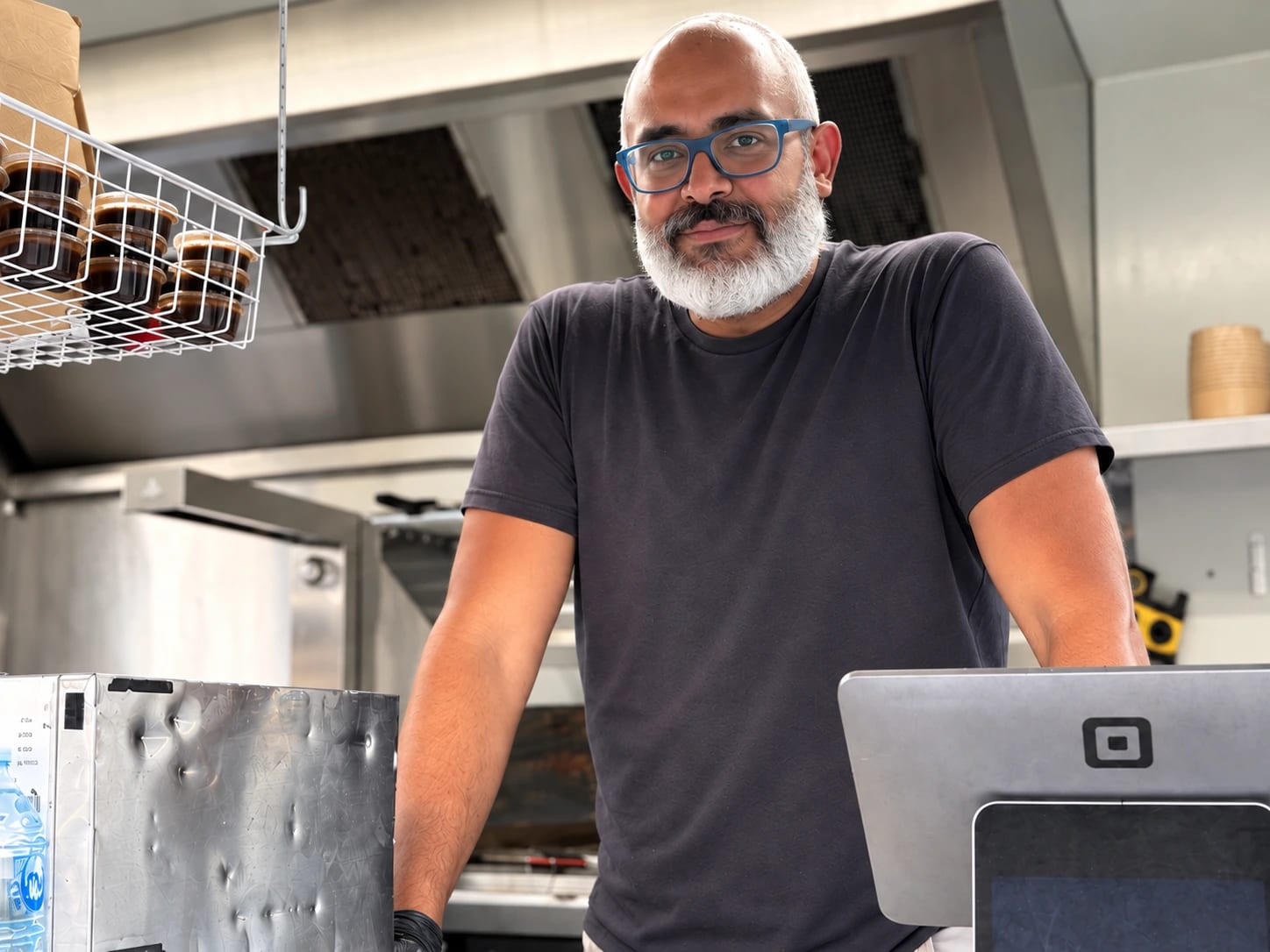 Mohamed at the counter of The Cairo Eatery food truck