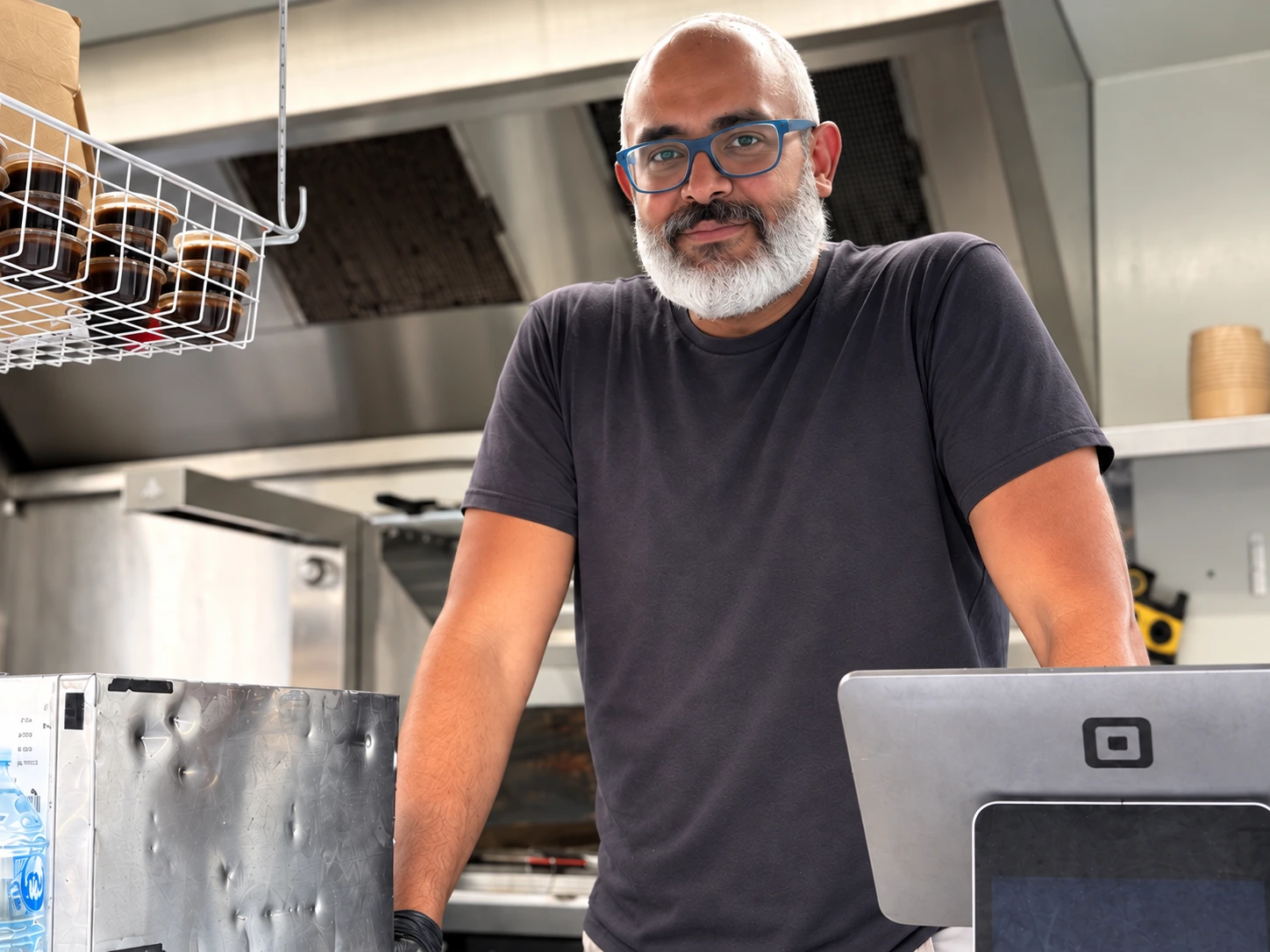 Mohamed at the counter of The Cairo Eatery food truck