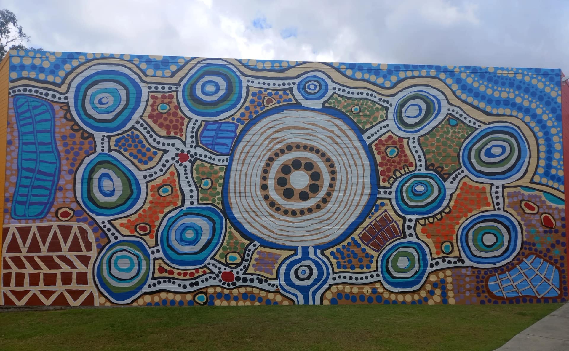 A colourful mural on the eastern wall of Logan Art Gallery in Logan Central