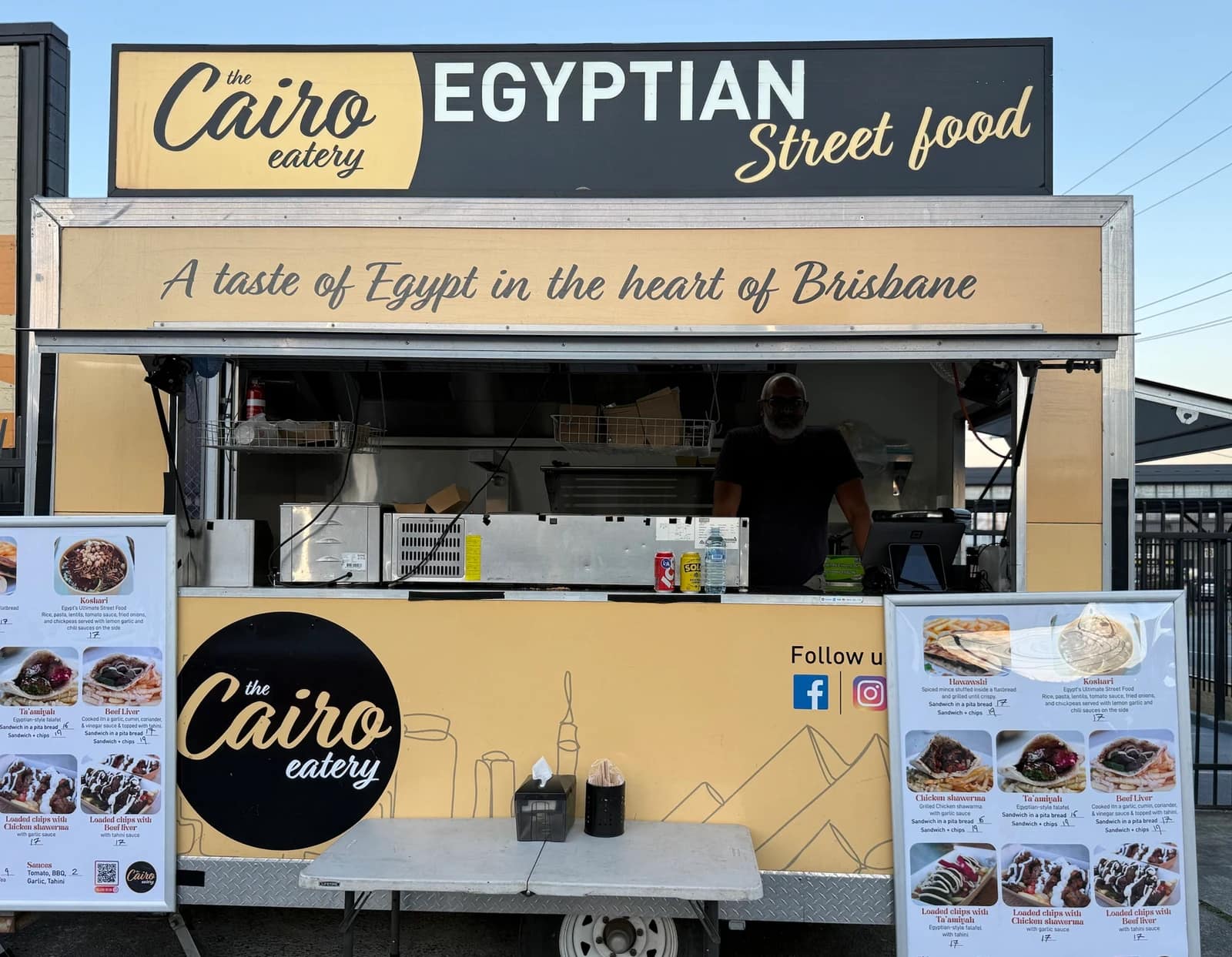 The Cairo Eatery truck, with its menu boards out for service.
