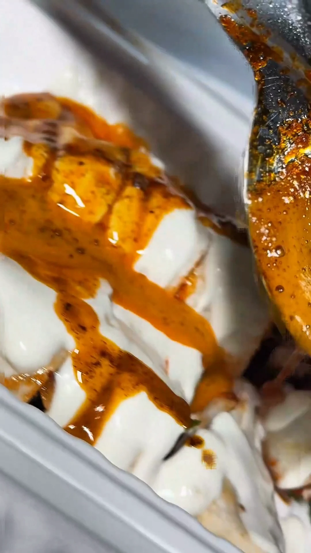 Finished chicken tantuni plate with garlic yoghurt and sizzling paprika butter at Kuzine Turkish Street Food